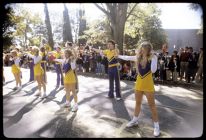 Cheerleaders performing in a parade